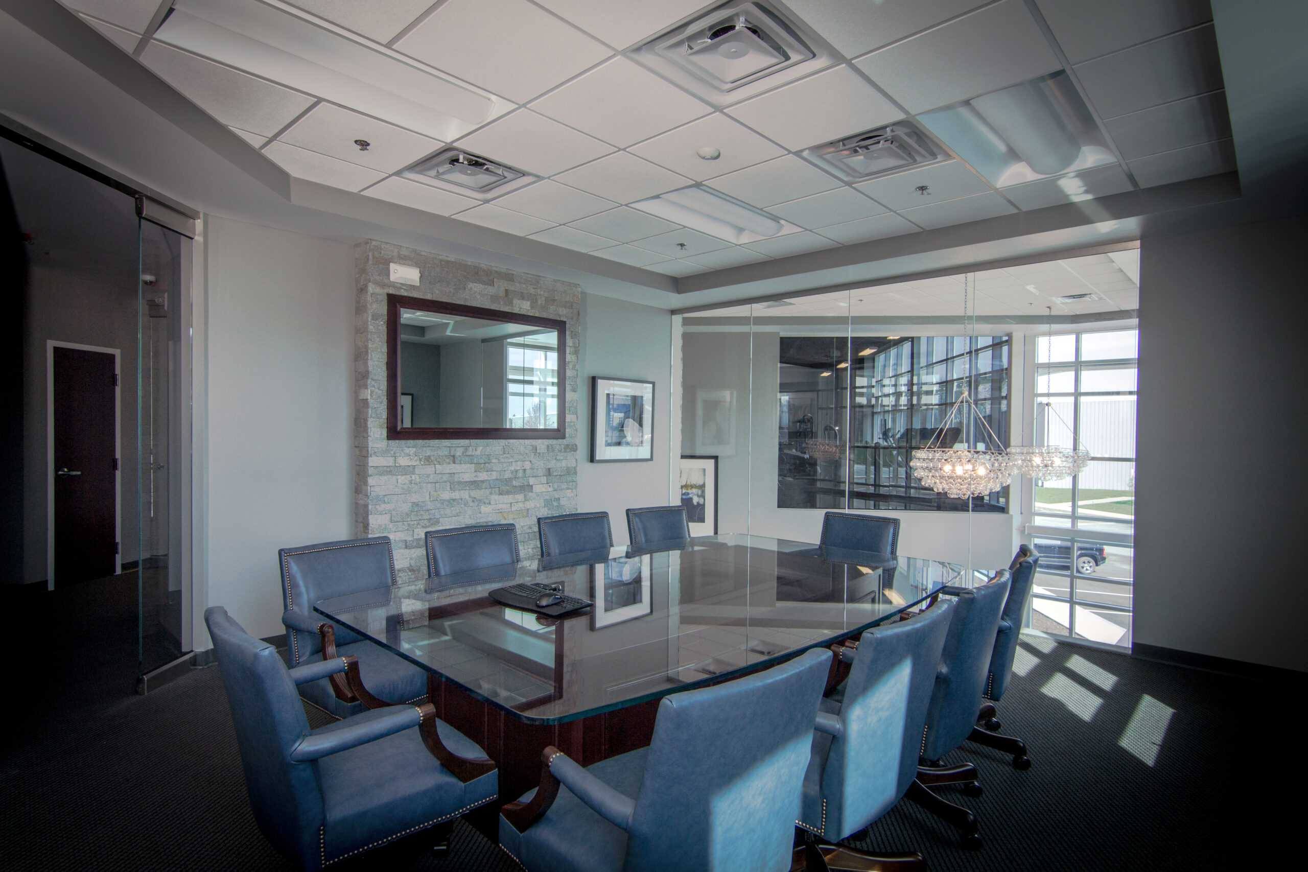 Conference room interior within a Butler steel office building.
